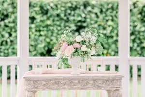 Ceremony Table with urn full of flowers