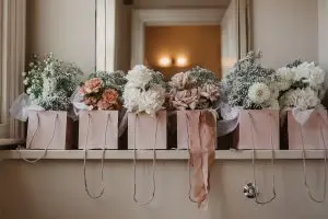 Bridesmaids Bouquets In A Row | Essex Wedding Planner