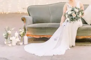 Bride surrounded by candles | Essex Wedding Planner